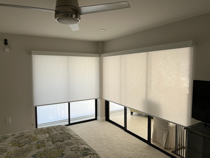 Bedroom with roller shades