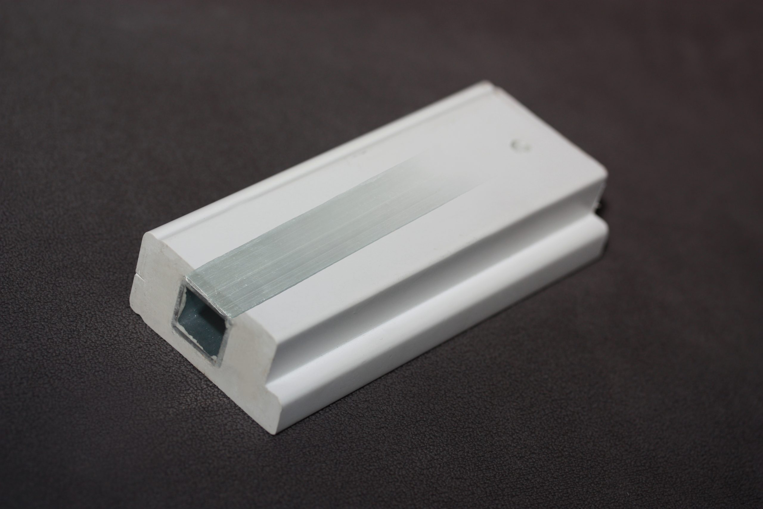 Aluminum reinforced shutter stile