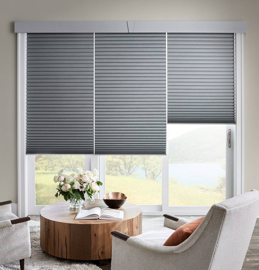 Custom roller and Roman shades in a Florida living room