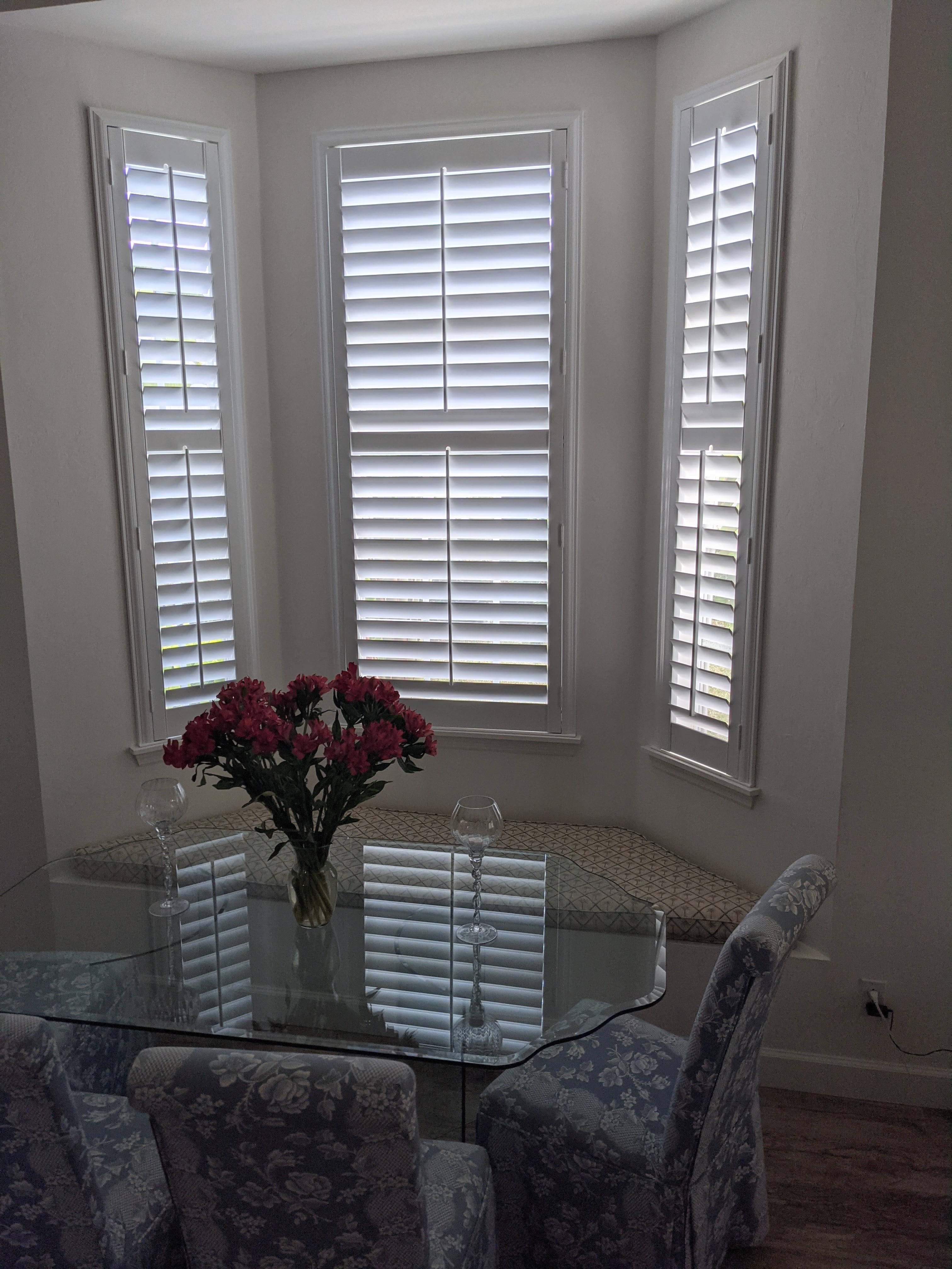 Aluminum reinforced shutters in a dining room