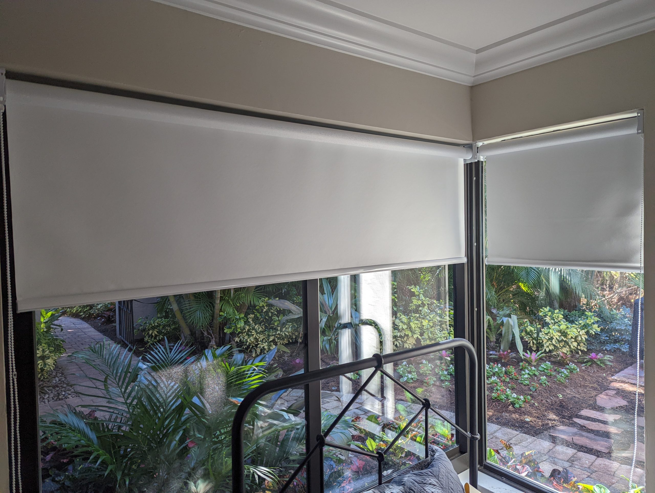 Custom roller shades in a Florida sunroom