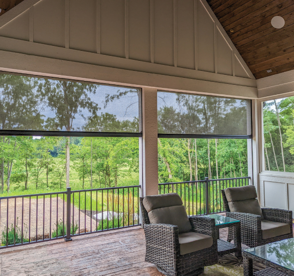 Enclosed patio with retractable shades